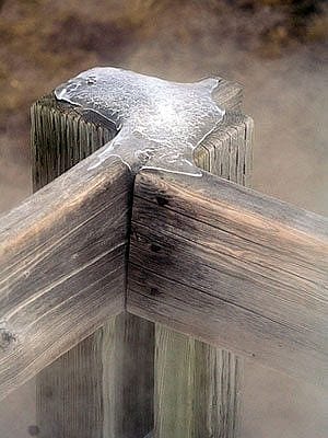 Winter in Yellowstone: ice on a fence