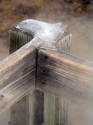 Winter in Yellowstone: ice on a fence