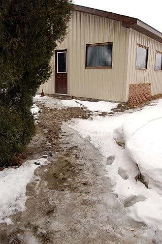 Frozen walkway to the mews.