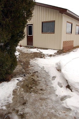 Frozen walkway to the mews.