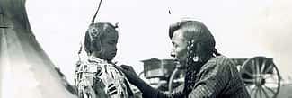 Native American man with young boy. MS 438 Forrest Fenn Indian Photographs. P.438.0144