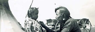 Native American man with young boy. MS 438 Forrest Fenn Indian Photographs. P.438.0144