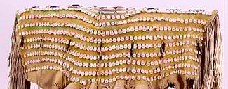 Cheyenne dress with cowrie shell adornment. Chandler-Pohrt Collection, Gift of Mr. William D. Weiss. NA.202.446 (detail)