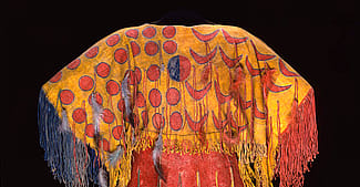 Ghost Dance dress, Southern Arapaho, c. 1890, 54 x 54 inches. Tanned elk hide with numerous pigments, feathers, and fringe. Chandler-Pohrt Collection. Gift of Mary J. and James R. Jundt. NA.204.4 (detail)