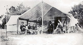 George Armstrong Custer (standing), Libby Custer (second from left) and others on Big Creek, Hays, Kansas, 1867. MS 71 Vincent Mercaldo Collection, McCracken Research Library. P.71.277