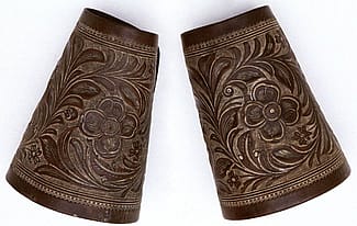 The F.A. Meanea Company of Cheyenne, Wyoming made these cuffs around 1861. Note the refined and detailed appearance of the carving. This is typical of the work done by this firm at that time. 1.69.1486a/b
