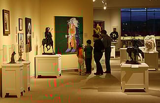 A family enjoys a Family Fun Day at the Center