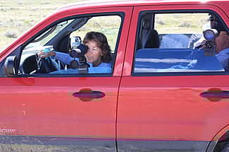Golden Eagle Posse members Rosemarie Hughes, John Ross (back seat near camera) and Richard Jones (back seat away from camera) keep track of eagles in nest 23A.