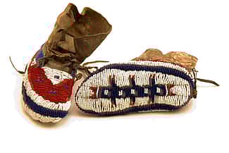 Child’s moccasins, ca. 1880. Tsistsistas (Cheyenne), Plains. The Paul Dyck Plains Indian Buffalo Culture Collection, acquired through the generosity of the Dyck family and additional gifts of the Nielson Family and the Estate of Margaret S. Coe. NA.202.1373