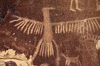 Thunderbird rock art at Legend Rock State Petroglyph Site, 55 miles southeast of Cody, Wyoming. C.R. Preston photo.