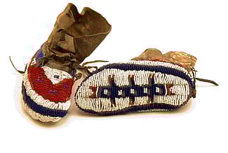 Child’s moccasins, ca. 1880. Tsistsistas (Cheyenne), Plains. The Paul Dyck Plains Indian Buffalo Culture Collection, acquired through the generosity of the Dyck family and additional gifts of the Nielson Family and the Estate of Margaret S. Coe. NA.202.1373