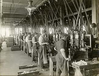 Working the drill presses, Winchester plant, 1912. MS 20 Winchester Repeating Arms Company Collection, McCracken Research Library. P.20.2994