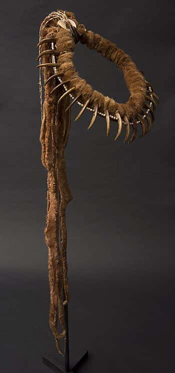 Bear claw necklace, Central Plains, ca. 1860. Otter hide, grizzly bear claws, glass beads, abalone shells, red ochre, porcupine quills. The Paul Dyck Plains Indian Buffalo Culture Collection, acquired through the generosity of the Dyck family and additional gifts of the Nielson Family and the Estate of Margaret S. Coe. NA.203.1585.