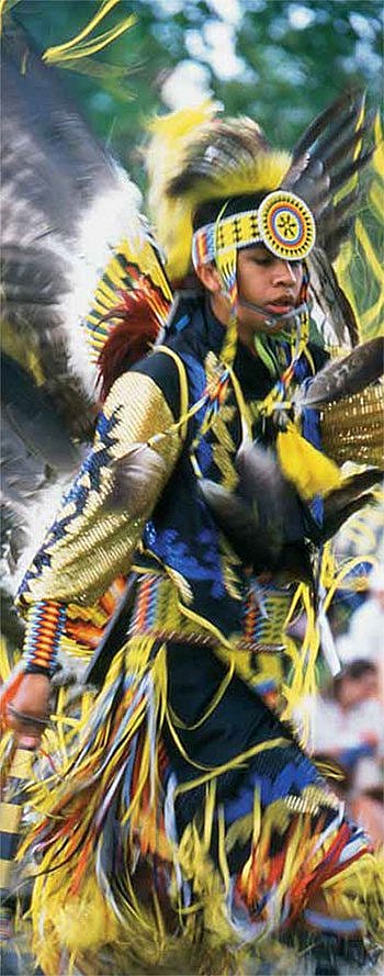 Craig Reeder, Kiowa-Wichita from Logan, Utah, in the Boy's Fancy Dance Contest at the 2002 Plains Indian Museum Powwow.