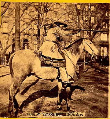 Buffalo Bill aiming a Hawken type, Plains Percussion rifle. MS 71 Vincent Mercaldo Collection, McCracken Research Library. P.71.13.2