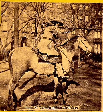 Buffalo Bill aiming a Hawken type, Plains Percussion rifle. MS 71 Vincent Mercaldo Collection, McCracken Research Library. P.71.13.2
