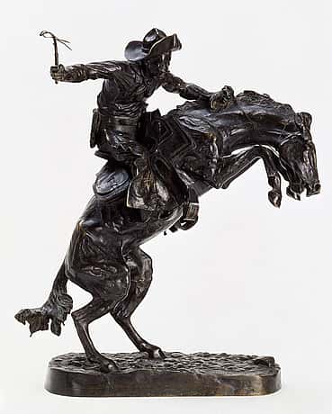 Frederic Remington (1861-1909). "The Broncho Buster," 1895. Bronze, 23.375 x 7.625 x 15.5 inches. Gift of G.J. Guthrie Nicholson Jr. and son in memory of their father/grandfather G.J. Guthrie Nicholson, rancher at Four Bear, Meeteetse, WY. 7.74