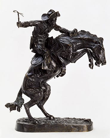 Frederic Remington (1861-1909). "The Broncho Buster," 1895. Bronze, 23.375 x 7.625 x 15.5 inches. Gift of G.J. Guthrie Nicholson Jr. and son in memory of their father/grandfather G.J. Guthrie Nicholson, rancher at Four Bear, Meeteetse, WY. 7.74