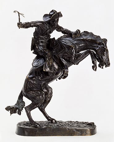 Frederic Remington (1861-1909). "The Broncho Buster," 1895. Bronze, 23.375 x 7.625 x 15.5 inches. Gift of G.J. Guthrie Nicholson Jr. and son in memory of their father/grandfather G.J. Guthrie Nicholson, rancher at Four Bear, Meeteetse, WY. 7.74