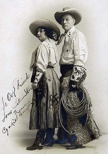Cy and Lill Compton, ca. 1905. Note swastika on skirt and Native designs on cuffs and gauntlets. Buffalo Bill's Wild West. Gift of Thomas P. Isbell. MS 6 William F. Cody Collection, McCracken Research Library. P.69.1901