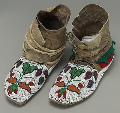 Crow Moccasins, ca. 1885. rawhide, felt, seeds, beads, cloth. NA.202.119