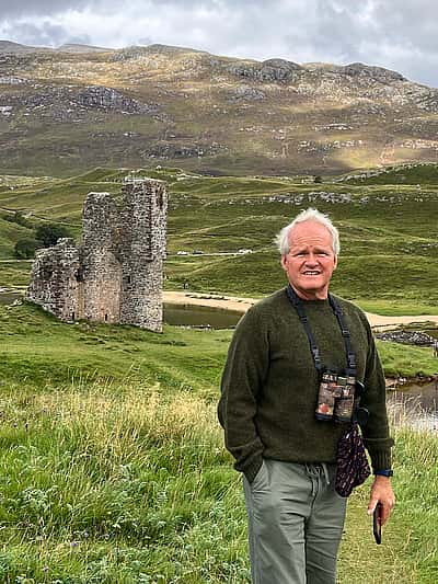 Eric C. Atkinson at Ardvreck Castle, Scotland, while researching rewilding in the Scottish Highlands as part of a Department of Education grant to internationalize the curriculum at Northwest College.