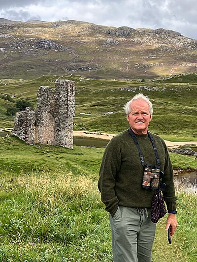 Eric C. Atkinson at Ardvreck Castle, Scotland, while researching rewilding in the Scottish Highlands as part of a Department of Education grant to internationalize the curriculum at Northwest College.