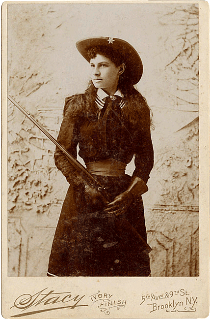 Annie Oakley in an early publicity photograph produced as a cabinet card by Stacy of Brooklyn, New York. P.71.0813