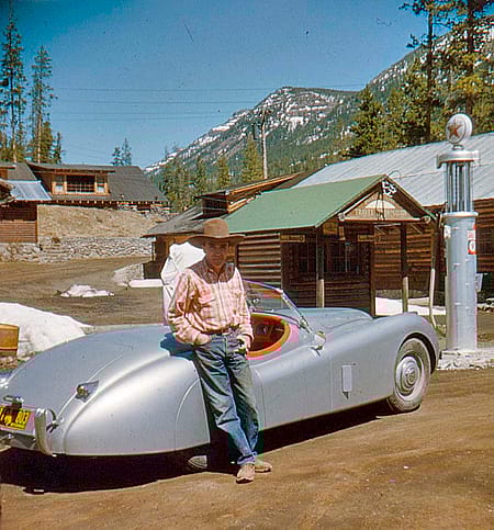 Early Hayner, a Pahaska employee, standing beside one of Henry Coe’s classic cars, next to the gas pump at Pahaska, early 1952. Coe family archives photos, used with permission.
