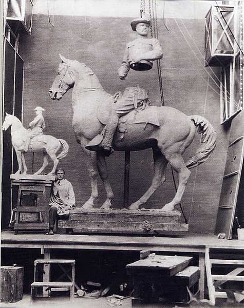 Alexander Phimister Proctor in his studio with the sculpture, Rough Rider, 1922.