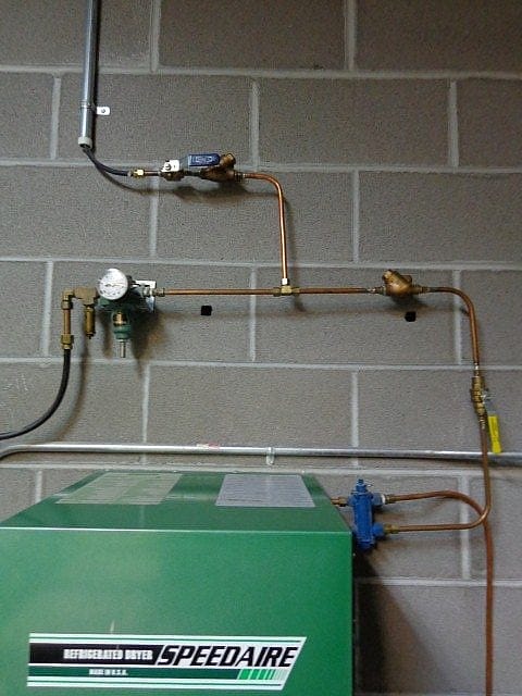 Properly installed check valves between compressors will provide seamless transition for pneumatic controls.