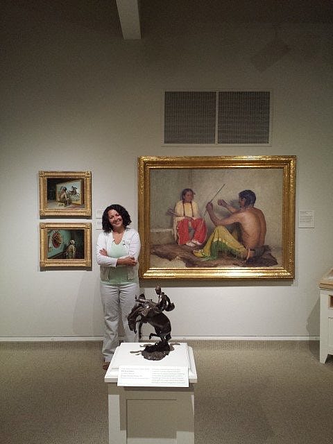 Whitney Intern Albena Maslinkova by a Joseph Henry Sharp painting, "The Broken Bow." 7.75