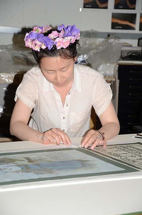 Kyoung-eun Park working on paper from Cody Firearms Museum