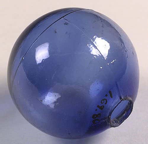 A Treasure from our West: Smooth blue glass target ball. Gift of Alex Kerr. 1.69.80