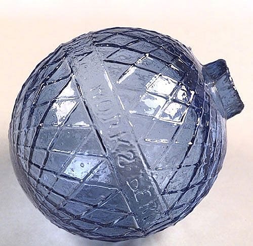 A Treasure from our West: Cross-hatch patterned blue glass target ball. 1.69.2083