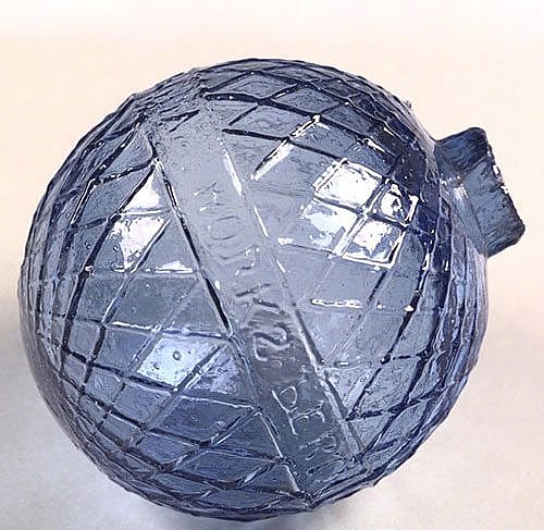 A Treasure from our West: Cross-hatch patterned blue glass target ball. 1.69.2083