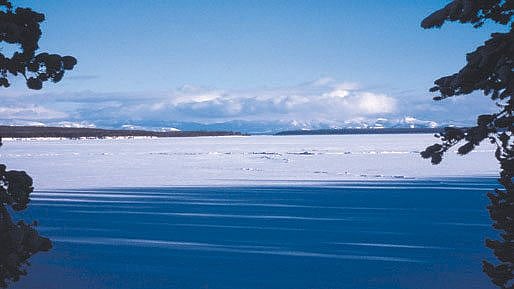 Yellowstone Lake frozen over. NPS photo by J. Schmidt, 1977.