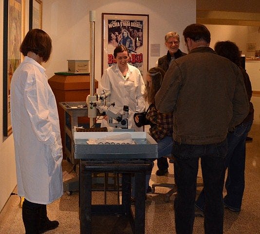 Rachel Lee and Ann Marie Donoghue demonstrate the microscope