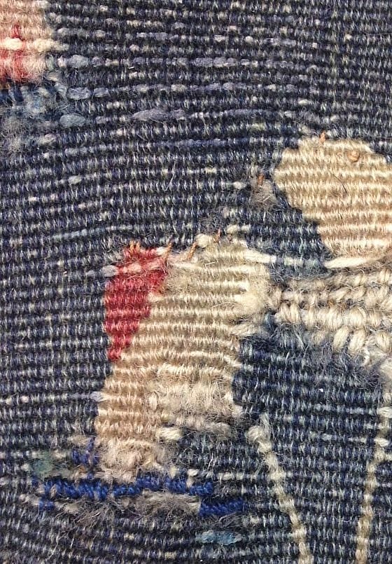 Mismatched blue warp thread