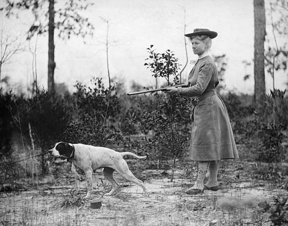 Annie Oakley, certainly one of the "daring western girls," and her bird dog Fred. MS 6 William F. Cody Collection, McCracken Research Library. P.69.0061