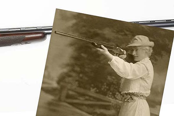 Ithaca Single Barrel Trap Gun, 12 gauge, Serial Number 264501, owned by Annie Oakley. Oakley with a rifle. 2008.10.1 and P.69.0932