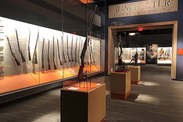 Firearms and the West gallery in the Cody Firearms Museum, with Winchester Factory lintel.