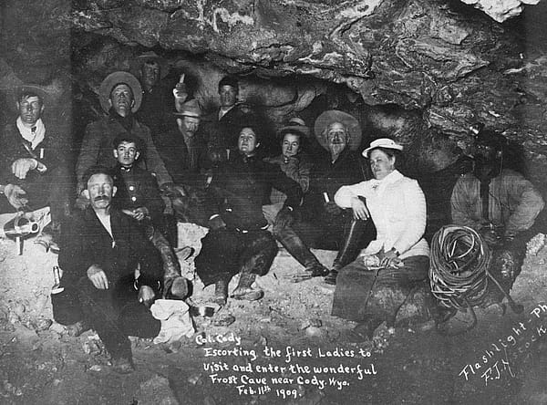 Black & white photo of William F. Cody with a group in Frost Cave, now knows as Spirt Mountain Cavern, 1909. MS 6 William F. Cody Collection, McCracken Research Library. P.69.0846