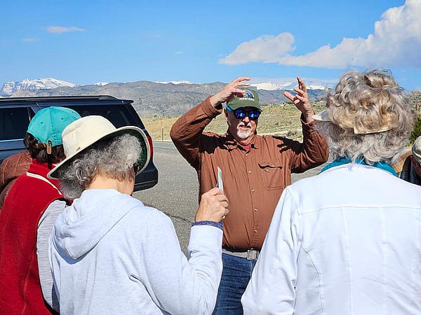 George Miller shares his knowledge of geology with field trip participants.