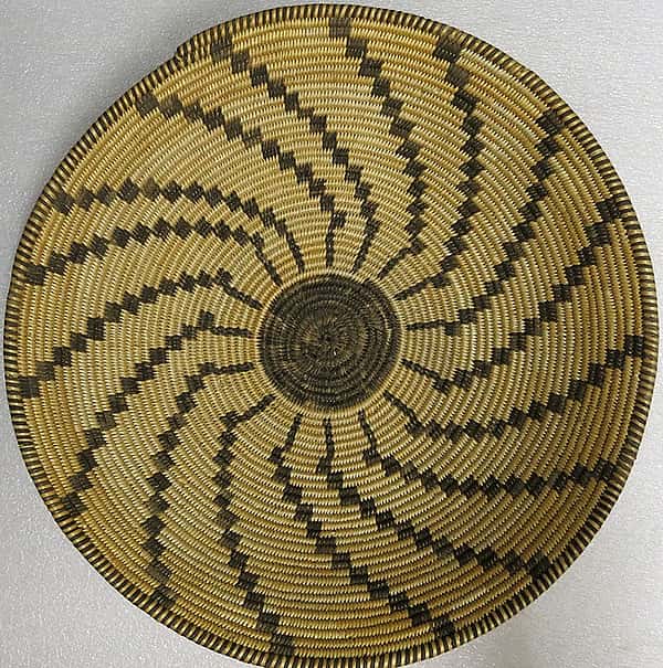 (Fig. 4) This Apache basket tray, ca. 1890, from Remington's studio collection (and now in the Whitney Western Art Museum) is similar to the basket in his sketch presented here. Gift of The Coe Foundation. 1.67.82