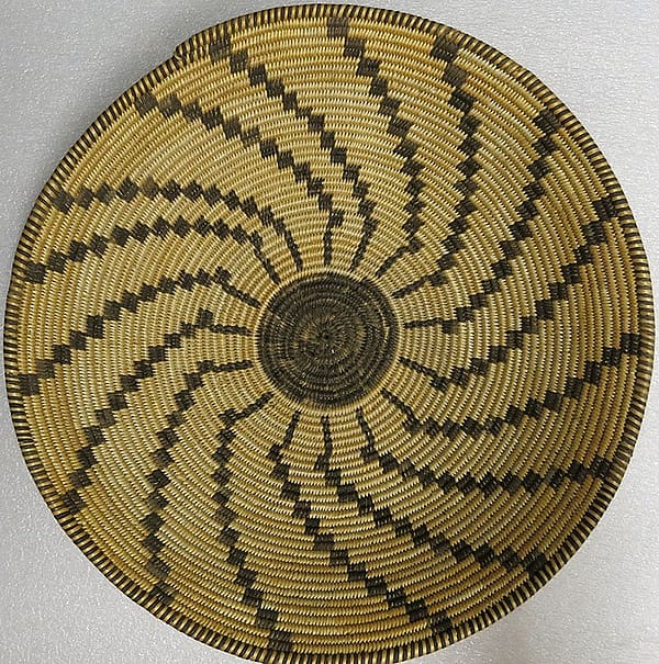 (Fig. 4) This Apache basket tray, ca. 1890, from Remington's studio collection (and now in the Whitney Western Art Museum) is similar to the basket in his sketch presented here. Gift of The Coe Foundation. 1.67.82