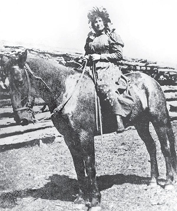 Ella "Cattle Kate" Watson on horseback. Wyoming State Archives, Department of State Parks and Cultural Resources. Sub Neg 4104
