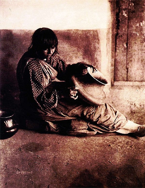 "The Potter - Santa Clara" 1905, photogravure plate 602 from the 20-volume set of Edward S. Curtis’s The North American Indian, Cambridge, Massachusetts: University Press, 1907-1930. Curtis is perhaps the most famous photographer of American Indians of the early 20th century.