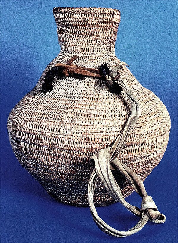 Basketry water jar, late 1800s. Ute, Southern Colorado. Sumac or willow, pine pitch, leather. Colorado Springs Fine Arts Museum.