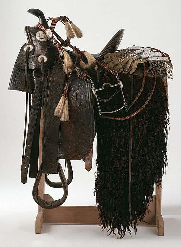 Saddle, ca. 1893, William Cody Boal Collection, 1.69.45 / Bridle and bit, ca. 1915, Mary Jester Allen Collection, 1.69.44A and B / Gauntlets, ca. 1885, Gift of Mrs. S.W. Harding, 1.69.2661 / Serape, ca. 1910, William Cody Boal Collection, 1.69.2639